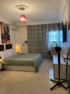 Postel nebo postele na pokoji v ubytování Appartement cosy World Rabat