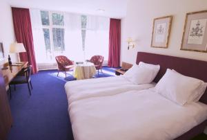 Postel nebo postele na pokoji v ubytování Nol in 't Bosch + 14 fotografií