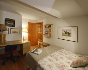 En eller flere senge i et værelse på Courmaison - Appartamento di charme