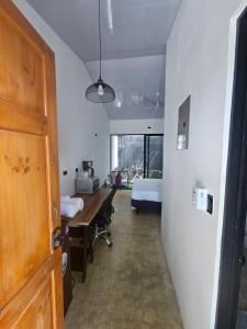 Ένα ή περισσότερα κρεβάτια σε δωμάτιο στο Boutique Studios Uvita