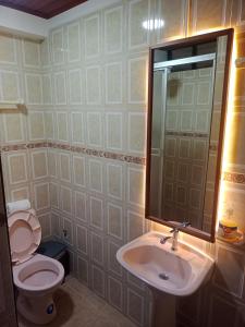 Koupelna v ubytování INTI & QUILLA Appartments + 13 fotografií