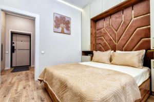 Ένα ή περισσότερα κρεβάτια σε δωμάτιο στο 2-комнатная квартира с видом на набережную, ЖК Абай Жолы