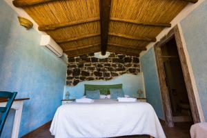 Ένα ή περισσότερα κρεβάτια σε δωμάτιο στο Ecoparco Neulè +89 φωτογραφίες