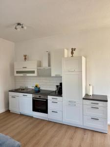 Η κουζίνα ή μικρή κουζίνα στο Robbe beim Ochsenturm am Deich