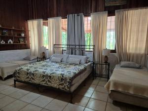 Postel nebo postele na pokoji v ubytování Lakefront house in Ometepe. Casa San Ramon + 74 fotografií