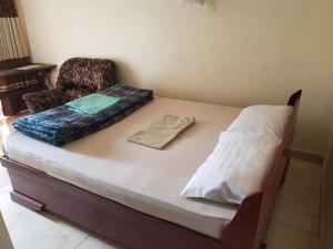 Ένα ή περισσότερα κρεβάτια σε δωμάτιο στο Kaliro Heights +8 φωτογραφίες