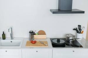 Η κουζίνα ή μικρή κουζίνα στο Luxury Top Floor, Balcony and Easy 24h Check-in