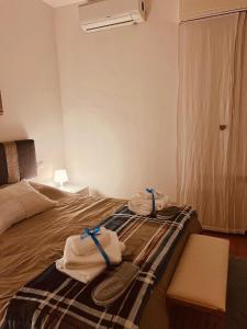 En eller flere senge i et værelse på Villa Cristina