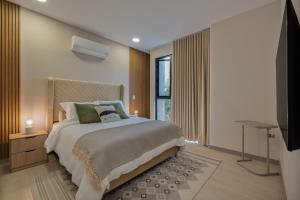 Voodi või voodid majutusasutuse Scandinavian luxury Apartment toas +25 fotot