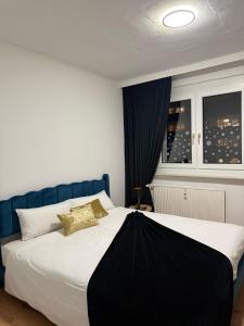 Ένα ή περισσότερα κρεβάτια σε δωμάτιο στο Ferienwohnung Rida - Stilvoll übernachten +15 φωτογραφίες