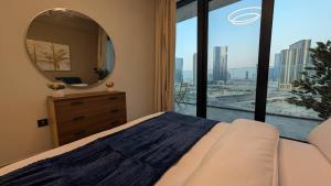 Ένα ή περισσότερα κρεβάτια σε δωμάτιο στο Stylish 1BR on Maryah Island Walk to Cleveland