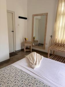 Ένα ή περισσότερα κρεβάτια σε δωμάτιο στο Villa Aureia