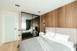 Giường trong phòng chung tại Central Rîșcani Loft