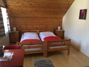 Postel nebo postele na pokoji v ubytování Villa Stadlmann
