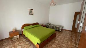 Postel nebo postele na pokoji v ubytování La Finestra sul Borgo