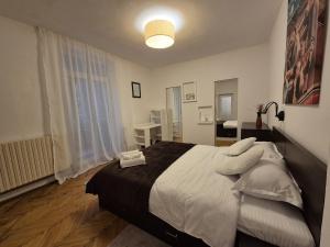 Ένα ή περισσότερα κρεβάτια σε δωμάτιο στο Apartament Bea