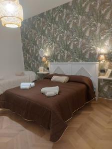 Giường trong phòng chung tại B&B La Rotonda