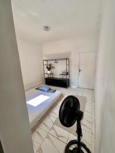 TV a/nebo společenská místnost v ubytování Residência Ruiz Conforto moderno e elegante em São Paulo