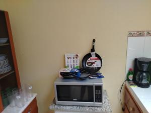 Kuchyň nebo kuchyňský kout v ubytování Hermosa vista, casa en Boquete.