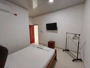 Televiisor ja/või meelelahutuskeskus majutusasutuses Sweet Dreams Necocli +27 fotot