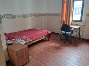 Ένα ή περισσότερα κρεβάτια σε δωμάτιο στο Casa Feliz