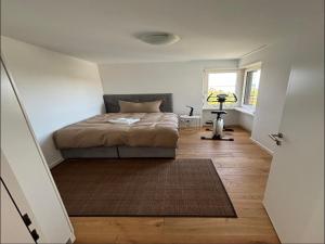 Ένα ή περισσότερα κρεβάτια σε δωμάτιο στο Seenähe 300 Meter 126 qm Wohnfläche 6 Betten