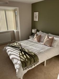 Voodi või voodid majutusasutuse Beautiful Cosy Yorkshire Home - Newly Refurbished toas