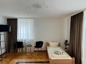 TV a/nebo společenská místnost v ubytování Pension Francesco