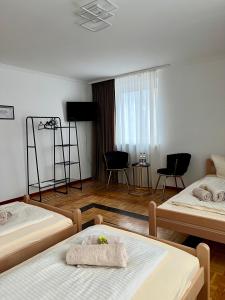 Postel nebo postele na pokoji v ubytování Pension Francesco