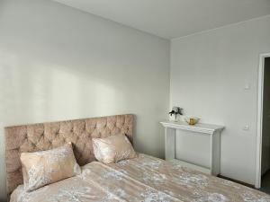 Ένα ή περισσότερα κρεβάτια σε δωμάτιο στο Side Korterid