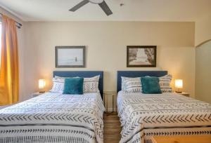 Ένα ή περισσότερα κρεβάτια σε δωμάτιο στο The Groovy Sandpad