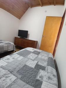 Postel nebo postele na pokoji v ubytování La Casa De Yayo