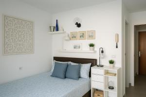 Ένα ή περισσότερα κρεβάτια σε δωμάτιο στο Columbus Playa +32 φωτογραφίες