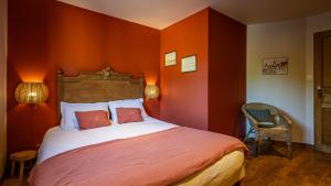 Postel nebo postele na pokoji v ubytování Le Moulin de l'O-L'Orle Nature formule 4 personnes