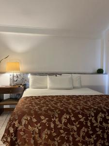 Ένα ή περισσότερα κρεβάτια σε δωμάτιο στο bamboo bed and breakfast