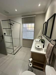 Koupelna v ubytování Lilly Bloom + 11 fotografií