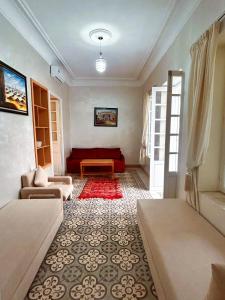 Postel nebo postele na pokoji v ubytování Riad Rabat Laalou