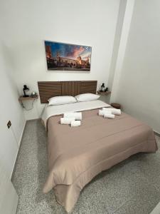 Una cama o camas en una habitación de D'Aversa Rooms