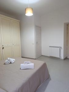 Postel nebo postele na pokoji v ubytování B&B al Vicolo