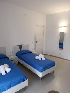 Postel nebo postele na pokoji v ubytování B&B al Vicolo + 24 fotografií