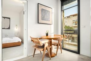 Postel nebo postele na pokoji v ubytování AYA Boutique ApartHotel By EZ TLV + 200 fotografií