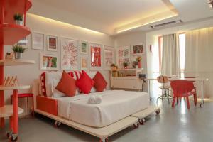 Posezení v ubytování The Urban Palette - Candolim Studio Apartment with Balcony and Mangrove Views + 67 fotografií