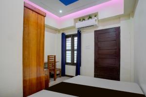 Postel nebo postele na pokoji v ubytování Hotel O Siva Jyothi + 21 fotografií