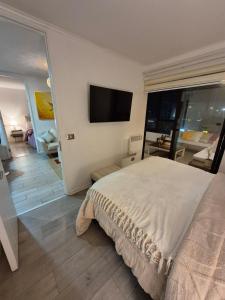 Кровать или кровати в номере Terraza Amplia Ubicación Premium Estacionamiento Privado