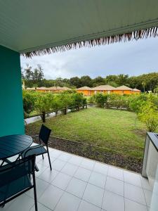 En have udenfor Colibri Rouj - Bungalow Cosy, proche Plage + 14 billeder