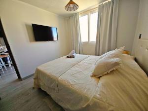 Postel nebo postele na pokoji v ubytování Sierra Ñuñoa Suite + 17 fotografií