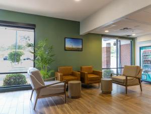 TV a/nebo společenská místnost v ubytování The Bridges Hotel