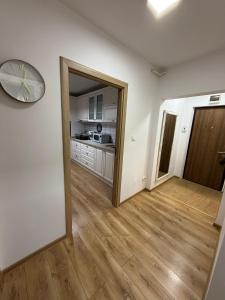 Kuchyň nebo kuchyňský kout v ubytování Ingrino Apartament + 1 fotografie