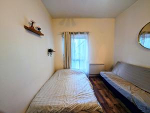 Postel nebo postele na pokoji v ubytování Charmant studio Val d'Europe - Montévrain