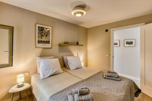 Giường trong phòng chung tại Casa Gall +35 ảnh